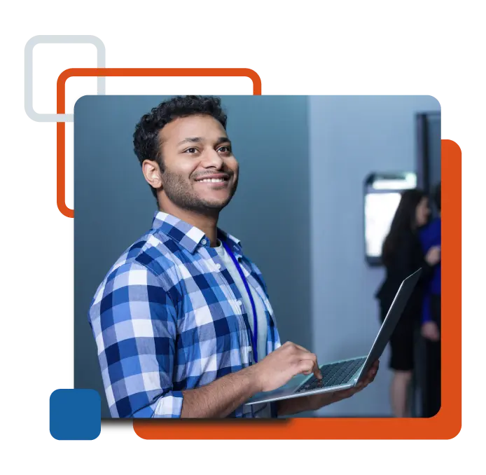 engineer walking around the office with his laptop