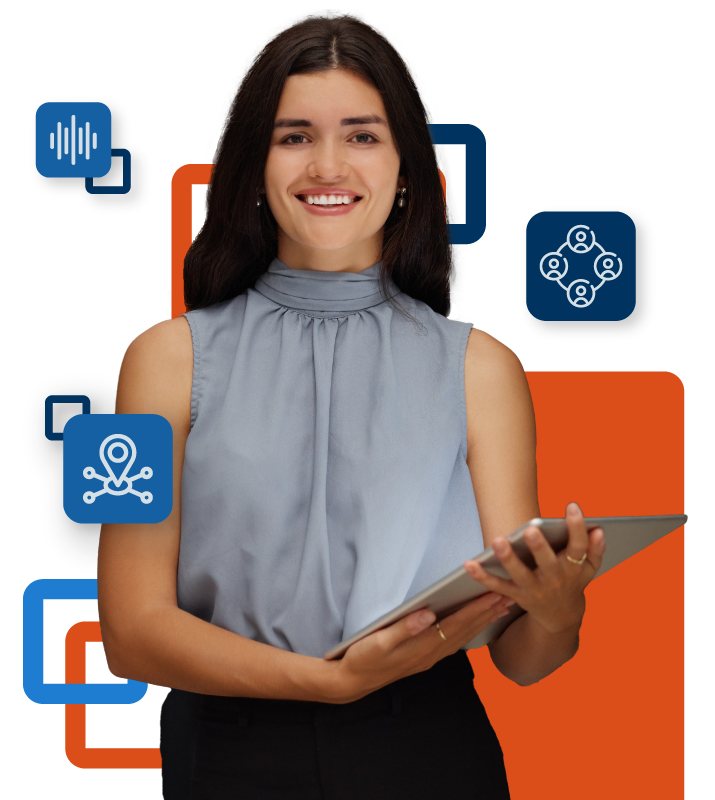 A person smiling while holding a tablet