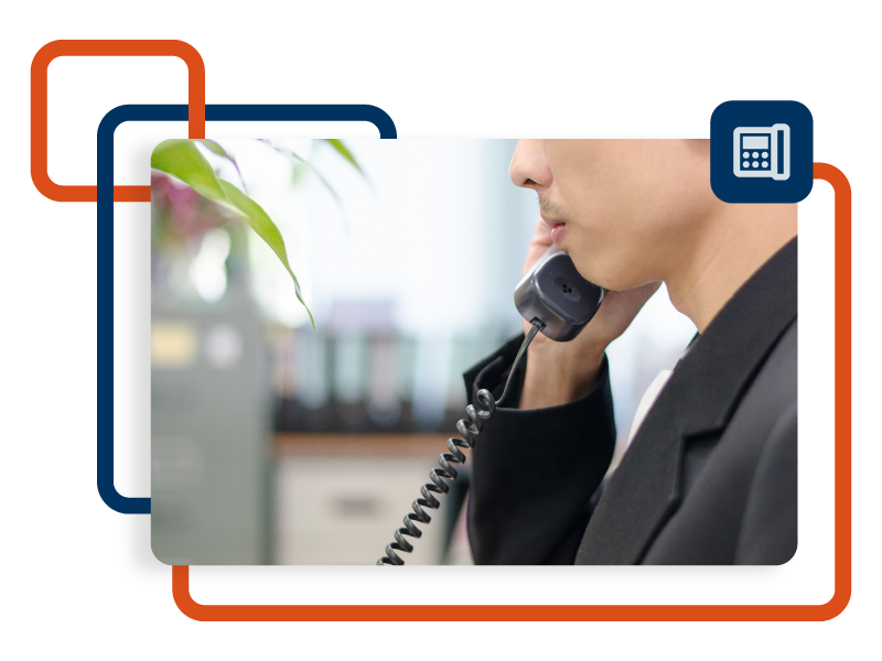 Person making a call on a telephone