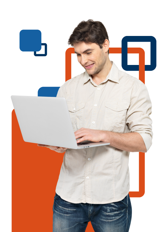 A person standing holding a laptop
