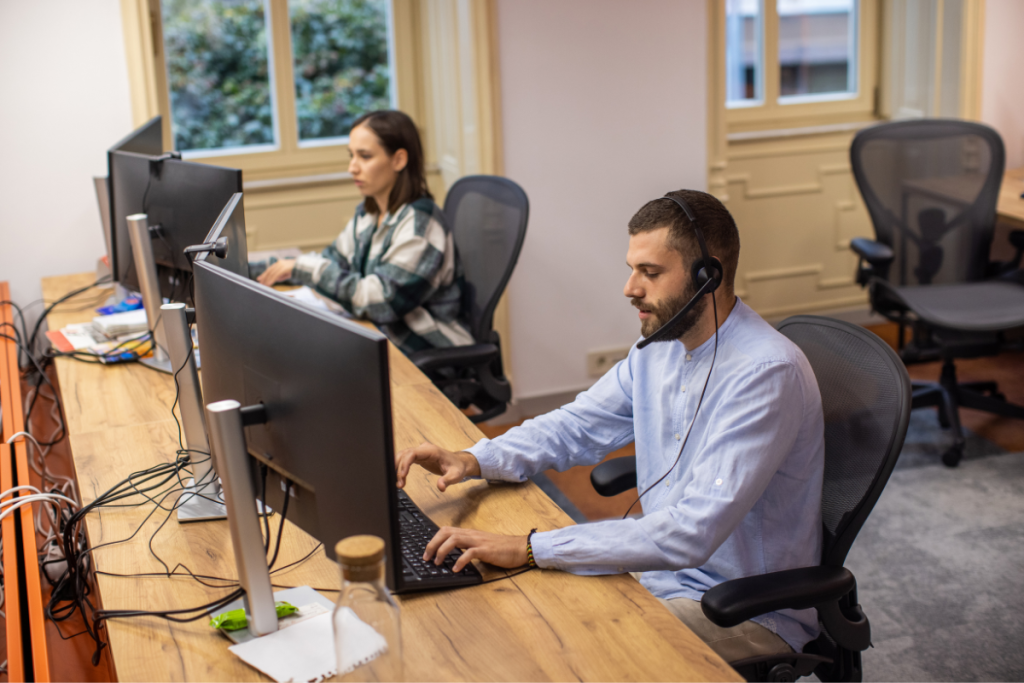 office IT worker proving support remotely